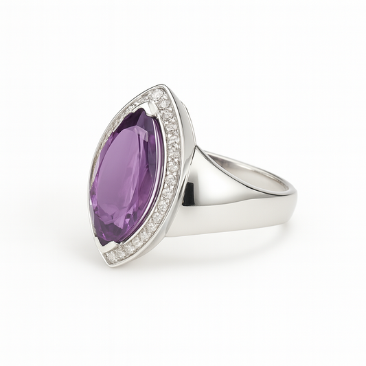 a modern silver ring with a central amethyst