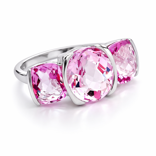 Ring with pink gemstones on a white background